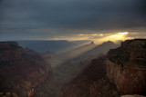 Dual exposures reveal the last rays of sun as they break through the clouds and illuminate the canyon below Cape Royal<br><br>