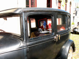 A Restaurant table in a vintage car