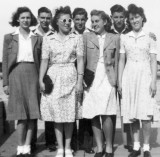 1943: Finchley, London.  From left: Pat, Bob, Mom, brother Bill, Marjorie, brother Clem, sister Thora.