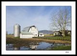 White barn  after the rains