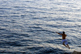 Leap of faith, cliff diving, walls of Dubrovnik
