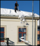 Taking down the snow from roofs in Hudiksvall