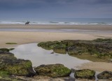 Ruiter langs het strand