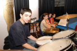 Matt on a Drum Set on Stage