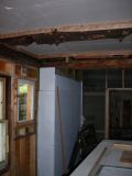 071506-N-0077 sheetrock work started - wall and ceiling.JPG