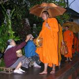 Buddhist monks collecting alms