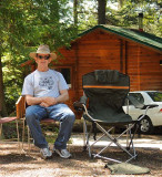 #63 Tim in Front of Cabin