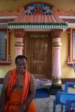 Priest in Front of His Residence