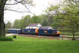 The CSX Derby train rolls through Duckers Station in the rain
