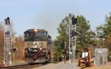 Southbound NS 215 passes a new set signals ready to be places in service at Milledgeville Ky