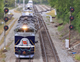 A pair of GRS searchlight signals stand guard at CP South Danville, as 111 leaves the yard 