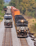 NS 223 passes the DPUs of Northbound 797 at McKinney 