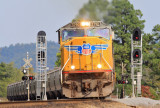 A UP SD70M leads NS 54G through the new signals at Milidgeville 