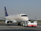 1540 5th February 09 Saudi Arabian Embraer 170 pushing at Sharjah Airport.jpg