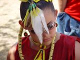 Young girl with feather