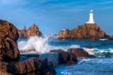 Surf and lighthouse, La Corbiere