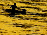 Canoeing on gold, West Bay