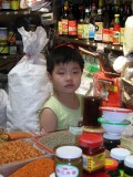 Beijing market - little boy with seasonings