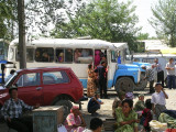 Outside Margilan market - local bus service - note driver hand-cranking engine!