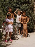 Local Uzbek kids outside Rishton Pottery Factory