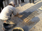 Tozeur brick works - pack the mud into the form