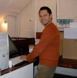 Robin happily computing in loft