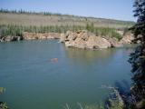 Kayakers enters five finger rapids