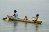 Family in a dugout canoe