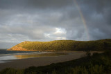 Late afternoon rainbow over Norman Bay