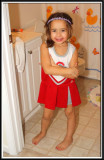 Arianna dresses up as a cheerleader