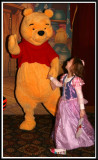 Pooh twirls Noelle around in her princess gown!