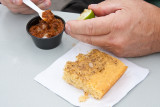 A little squeeze of lime... a little cornbread... now, thats good eats!