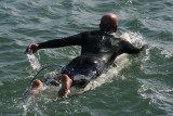 feet of a surfer