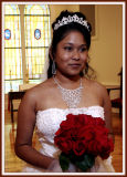 A Pensive Bride, Her Jewelry, Gown and Flowers