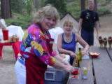  Get back to camp and find Toms wife Mary Pat & Gary wife Dena ,setting up for the evening Wine Safari 