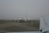 A 747 and an A380 seen from a 777 : 400 million for all three