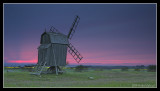 Windmill on land at Sunset