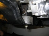 View of the modded crossmember  bracket in the car