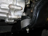 View of the modded crossmember  bracket in the car