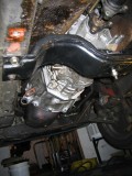 View of the modded crossmember  bracket in the car
