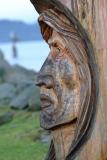 Wooden faces around the waterfront