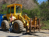 This fork lift and driver lifted the rails and carried them away