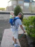 after landscaping, before sod.  J helps daddy.