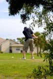 Alex playing golf