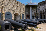 Row of cannons under a signal mast at the Citadel in Halifax Nova Scotia