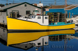 Yellow lobster boat at Fishermans Cove Eastern Passage Halifax Nova Scotia