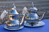 Sweet and unsweetened mint tea in silver teapots outdoors at Oualidia Morocco