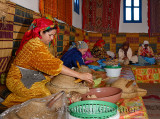 Moroccan womens cooperative at Afous Argane making argan oil by hand in a production line