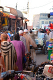 Busy souk market street of Marrakech Morocco crowded with people