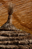 Abstract of straw umbrella and bamboo roof inside Kasbah Amerhidil in the Skoura oasis Morocco